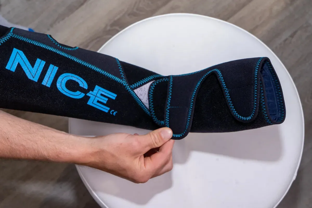 The NICE ankle wrap being wrapped around a lower leg